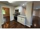 Bright kitchen showcasing granite countertops, stainless steel appliances, and white cabinetry at 2545 Glenrock Dr, Decatur, GA 30032