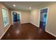Elegant living room features beautiful hardwood floors and neutral paint, creating a cozy ambiance at 2545 Glenrock Dr, Decatur, GA 30032