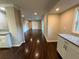 Spacious living room area featuring dark wood floors, fresh paint, and natural light at 2545 Glenrock Dr, Decatur, GA 30032