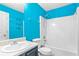 Bright bathroom with tub/shower combo and turquoise walls at 273 Baywood Xing, Hiram, GA 30141