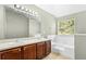 Bathroom featuring a bathtub and double vanity at 273 Baywood Xing, Hiram, GA 30141