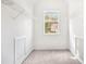 Walk-in closet features shelving and a window for natural light at 273 Baywood Xing, Hiram, GA 30141