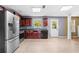 Well-equipped kitchen with stainless steel appliances, dark wood cabinets, and ample counter space at 273 Baywood Xing, Hiram, GA 30141