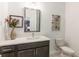 Well-lit bathroom with modern vanity, ample counter space, and decorative accents at 371 Grant Cir # 1813, Atlanta, GA 30315