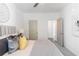 Bright bedroom with a ceiling fan, large windows, and a comfortable bed with decorative pillows at 371 Grant Cir # 1813, Atlanta, GA 30315