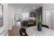 Modern kitchen features stainless steel appliances, a center island, and a breakfast bar with stylish pendant lighting at 371 Grant Cir # 1813, Atlanta, GA 30315