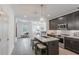 Well-equipped kitchen with an island, granite countertops, stainless steel appliances, and pendant lighting at 371 Grant Cir # 1813, Atlanta, GA 30315