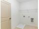 Laundry room features modern appliances, tile flooring, and a neutral color scheme at 371 Grant Cir # 1813, Atlanta, GA 30315
