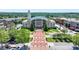 Exterior elevation of the City Hall featuring manicured greenery and a brick-laid walkway at 767 Farmstead Rd, Suwanee, GA 30024