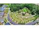 Beautiful community park with walking trails, lush landscaping, and recreational areas for residents at 767 Farmstead Rd, Suwanee, GA 30024