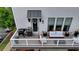 Inviting deck with outdoor seating, grill, pizza oven, and stylish decor, perfect for entertaining at 767 Farmstead Rd, Suwanee, GA 30024
