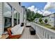 Inviting outdoor deck with plush seating and fire pit, offering a serene space to unwind and enjoy outdoor living at 767 Farmstead Rd, Suwanee, GA 30024