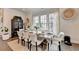 Tastefully decorated dining area featuring a large wooden table at 767 Farmstead Rd, Suwanee, GA 30024