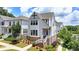 Charming two-story home with landscaped front yard, inviting curb appeal at 767 Farmstead Rd, Suwanee, GA 30024