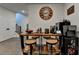 Bar area, staircase, fish tank and interior doors in the updated and open living room at 767 Farmstead Rd, Suwanee, GA 30024