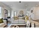 Comfortable living room features a plush sofa and is decorated with modern accents at 767 Farmstead Rd, Suwanee, GA 30024