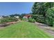 View of park path leading to a covered pavilion and picnic space at 767 Farmstead Rd, Suwanee, GA 30024