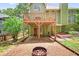 Backyard patio area, featuring the elevated wooden deck, and room to entertain at 1876 Hamby Place Nw Dr, Acworth, GA 30102