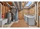 Unfinished basement is equipped with utilities, a laundry sink, and ready to be customized at 1876 Hamby Place Nw Dr, Acworth, GA 30102