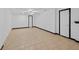 Finished basement area featuring neutral tile flooring, and simple fixtures at 1876 Hamby Place Nw Dr, Acworth, GA 30102