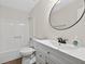 Bathroom featuring a tub, shower, modern sink, and vanity, all in a clean white design at 1876 Hamby Place Nw Dr, Acworth, GA 30102