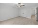 Spacious bedroom features plush carpeting and ceiling fan at 1876 Hamby Place Nw Dr, Acworth, GA 30102