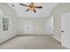 This bedroom showcases a vaulted ceiling at 1876 Hamby Place Nw Dr, Acworth, GA 30102