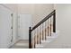 Hallway and staircase featuring neutral colors and natural light at 1876 Hamby Place Nw Dr, Acworth, GA 30102