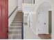 Inviting foyer with staircase and neutral color palette at 1876 Hamby Place Nw Dr, Acworth, GA 30102