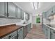 Spacious kitchen features stainless appliances and wood countertops with ample counter space at 1876 Hamby Place Nw Dr, Acworth, GA 30102