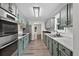 Galley kitchen with stainless steel appliances, and stone countertops at 1876 Hamby Place Nw Dr, Acworth, GA 30102