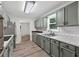 Updated kitchen with stainless steel appliances and sleek countertops provides space to cook at 1876 Hamby Place Nw Dr, Acworth, GA 30102