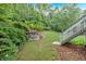 The home has a terraced backyard with grass at 212 Thorncliff Way Way, Acworth, GA 30101