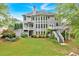 Expansive home backyard with a large deck, lush lawn and beautiful landscaping at 212 Thorncliff Way Way, Acworth, GA 30101