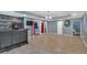 Open basement featuring a stylish bar area, tile floors, and an open floor plan perfect for entertaining at 212 Thorncliff Way Way, Acworth, GA 30101