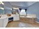 Elegant bathroom featuring double vanities, a soaking tub, and tasteful tile work at 212 Thorncliff Way Way, Acworth, GA 30101