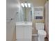 Functional bathroom featuring white cabinetry, a toilet and shower with curtains at 212 Thorncliff Way Way, Acworth, GA 30101