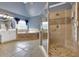 Luxurious bathroom featuring a walk-in shower, soaking tub, and dual vanities at 212 Thorncliff Way Way, Acworth, GA 30101