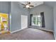 Bedroom with carpet, large windows and ensuite bathroom at 212 Thorncliff Way Way, Acworth, GA 30101
