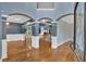 Elegant foyer with hardwood floors, archways, and soaring ceilings leading to the living spaces at 212 Thorncliff Way Way, Acworth, GA 30101