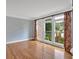 Bright living room with hardwood floors, large windows, and neutral wall paint at 212 Thorncliff Way Way, Acworth, GA 30101