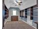 Walk-in closet featuring custom shelving and storage at 212 Thorncliff Way Way, Acworth, GA 30101