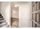 Welcoming entryway with wood-look floors and stairs to the left at 2459 Cedar Canyon Se Ct, Marietta, GA 30067