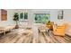 Bright living room featuring large windows, hardwood floors, and comfortable seating at 2459 Cedar Canyon Se Ct, Marietta, GA 30067