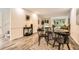 Open-concept living room featuring hardwood floors, modern decor, and lots of natural light at 2459 Cedar Canyon Se Ct, Marietta, GA 30067
