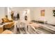 Well-lit open-concept living room with hardwood floors and modern decor at 2459 Cedar Canyon Se Ct, Marietta, GA 30067