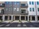 Townhome parking with covered carports and sleek design at 371 Grant Cir # 1812, Atlanta, GA 30315