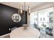 Cozy dining area with a large round table, stylish decor, and access to an outdoor space at 371 Grant Cir # 1812, Atlanta, GA 30315