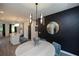 Open-concept dining area with modern decor and easy access to the kitchen and living spaces at 371 Grant Cir # 1812, Atlanta, GA 30315