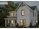 Charming two-story farmhouse with white siding, black framed windows, and a welcoming front porch at 4931 Happy Hollow Rd, Atlanta, GA 30360